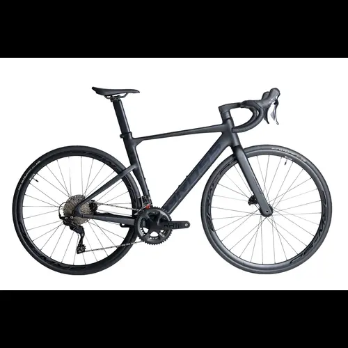 The BROSS Zenith A R7120 is designed for riders seeking performance and value. Built with a lightweight alloy frame, a carbon fork, carbon Integrated handlebar, and fully integrated internal cable routing, it delivers sleek aerodynamics and precise handling. Equipped with Shimano 105 R7100 2x12-speed drivetrain and powerful hydraulic disc brakes, the Zenith A5 ensures smooth shifting, reliable stopping power, and comfort on long rides. Perfect for road enthusiasts looking for a modern, race-inspired bike at an accessible price.